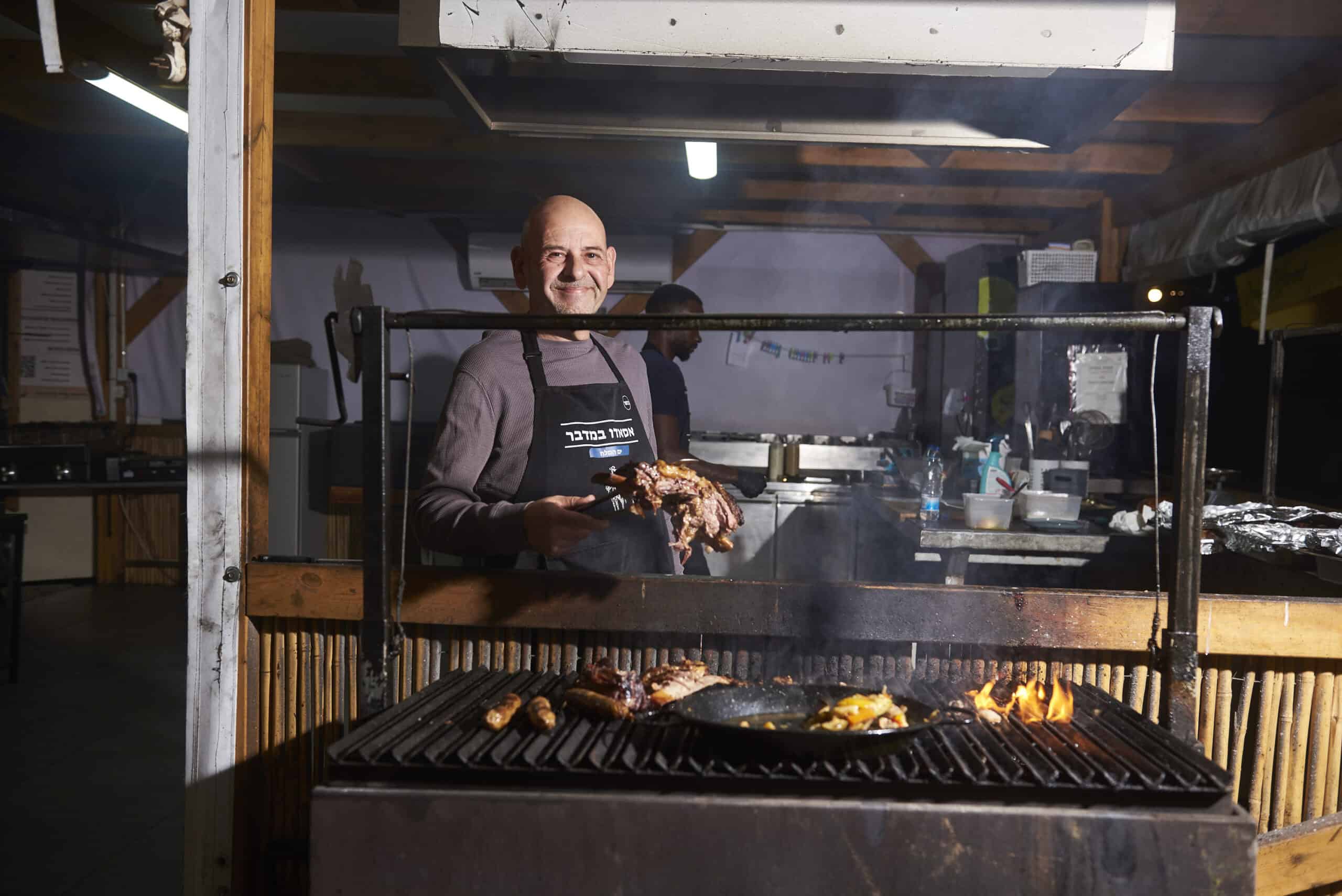Chef working at the Asado BaMidbar grill